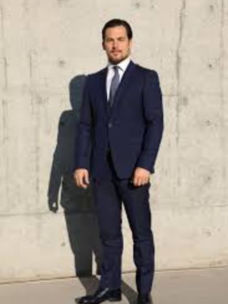 Gianniotti posing for his phootshoot with wearing fancy suit